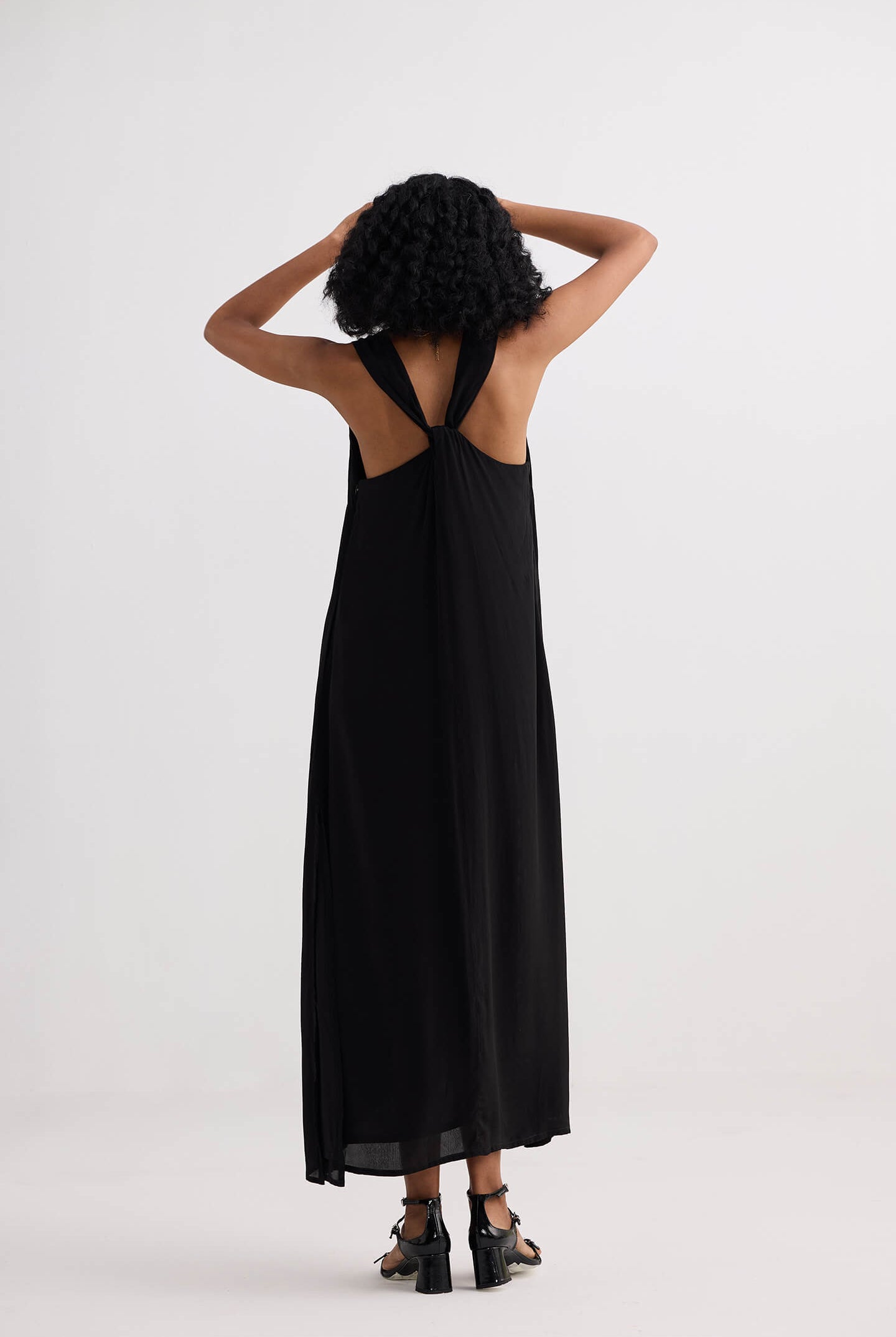 Crossed in Chic Sleeveless Maxi Dress in Black Longshot