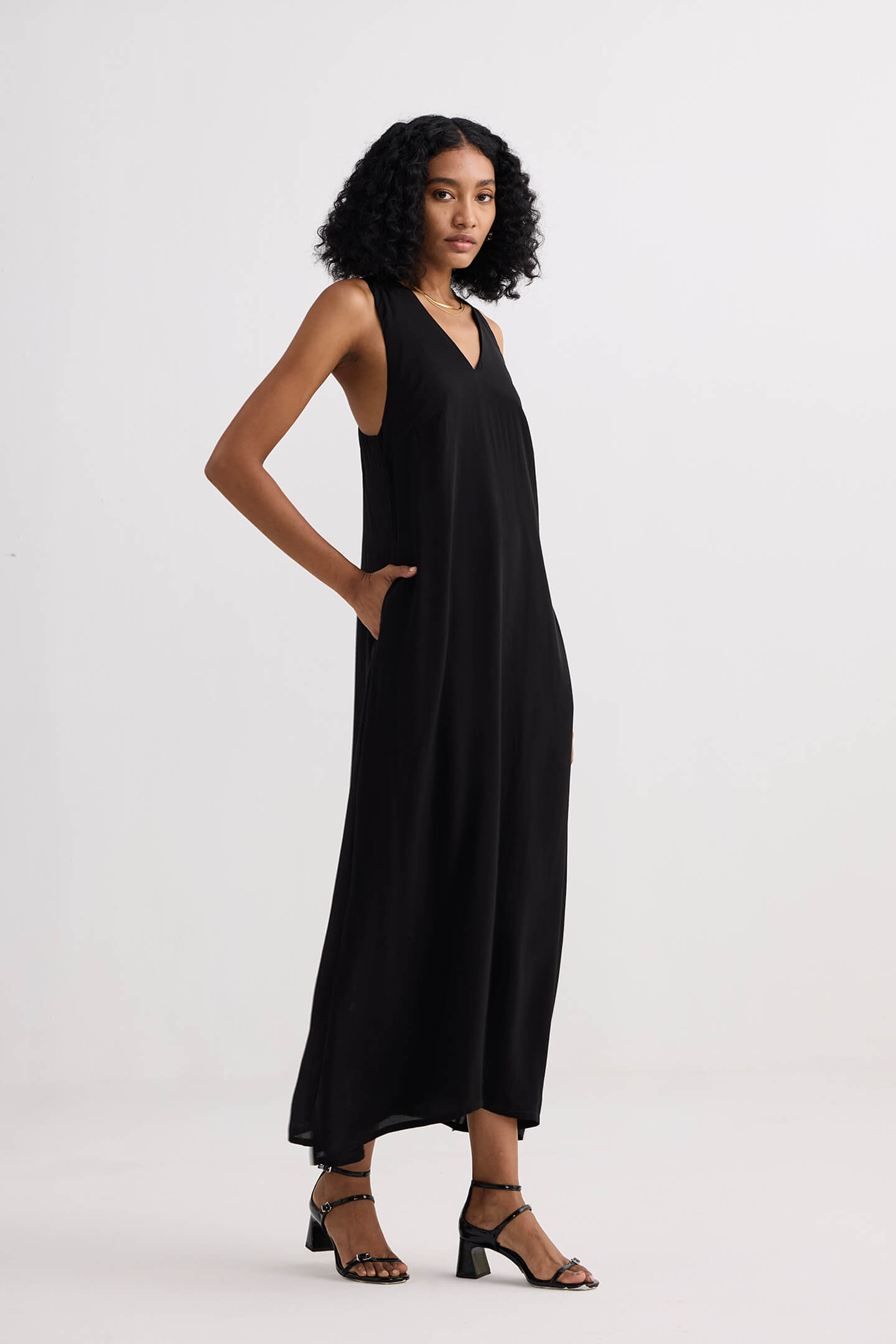 Crossed in Chic Sleeveless Maxi Dress in Black Longshot