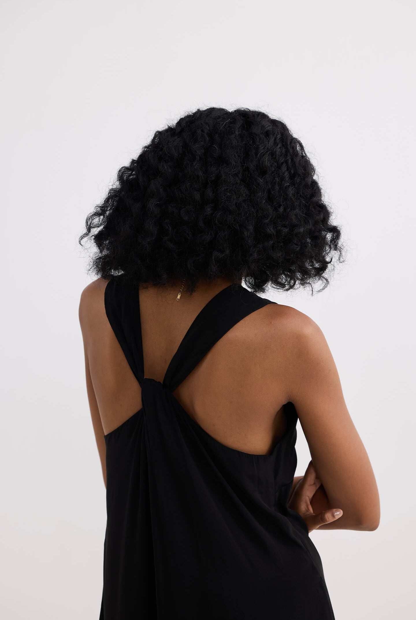 Crossed in Chic Sleeveless Maxi Dress in Black Longshot