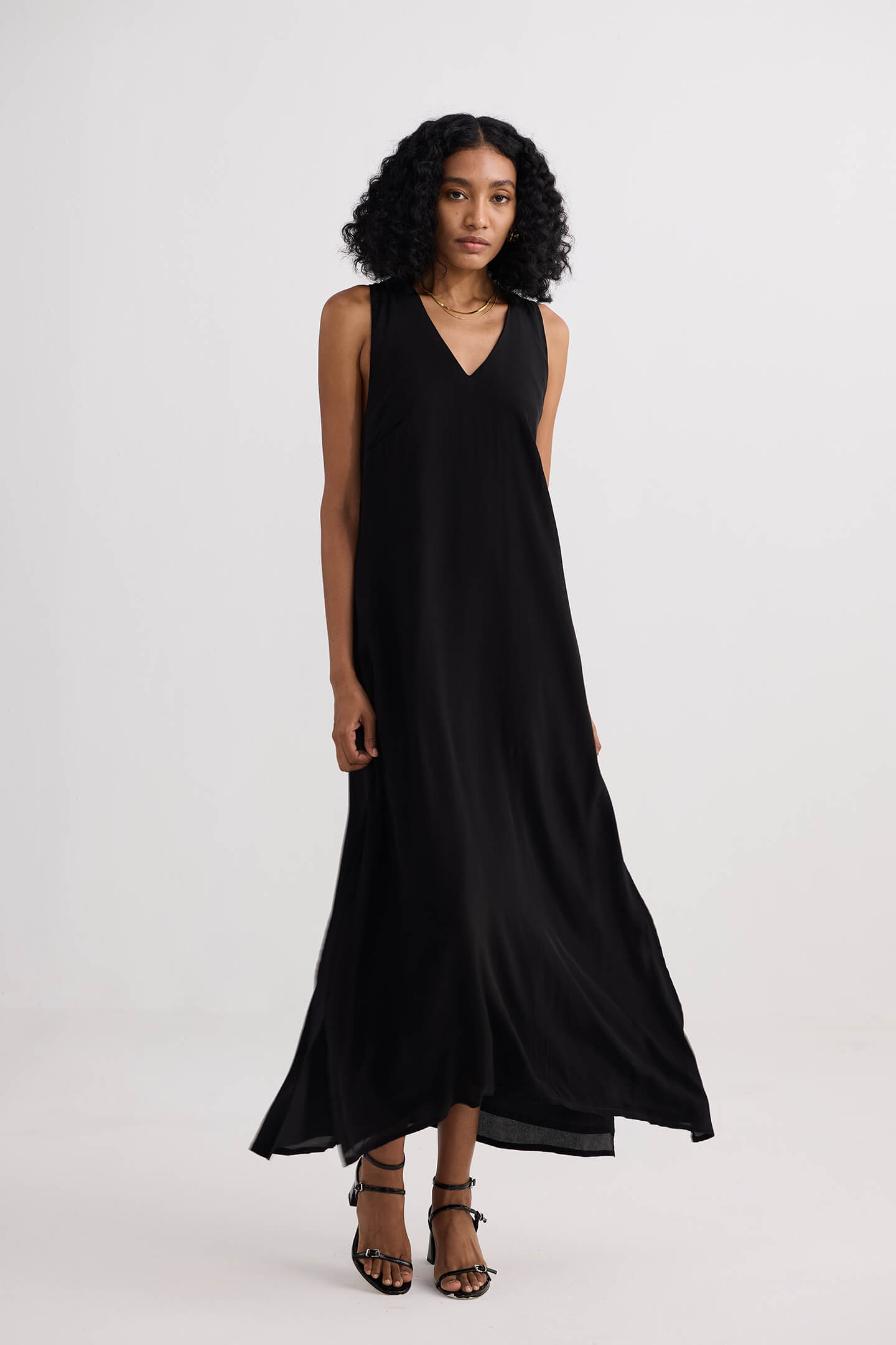 Crossed in Chic Sleeveless Maxi Dress in Black Longshot