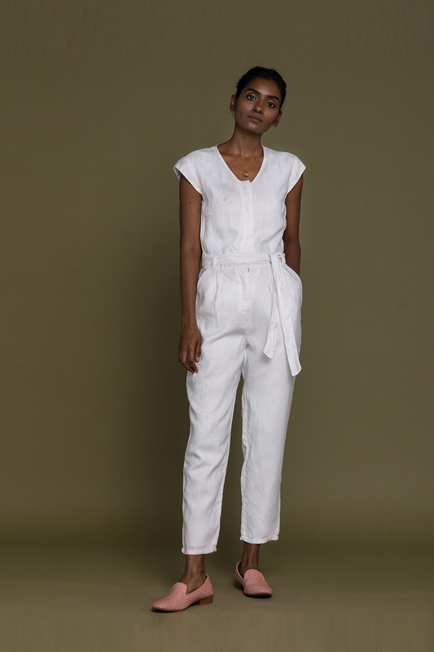 Reistor Evening Chai Jumpsuit in White featuring a relaxed silhouette, tie waist, breathable fabric, and timeless elegance