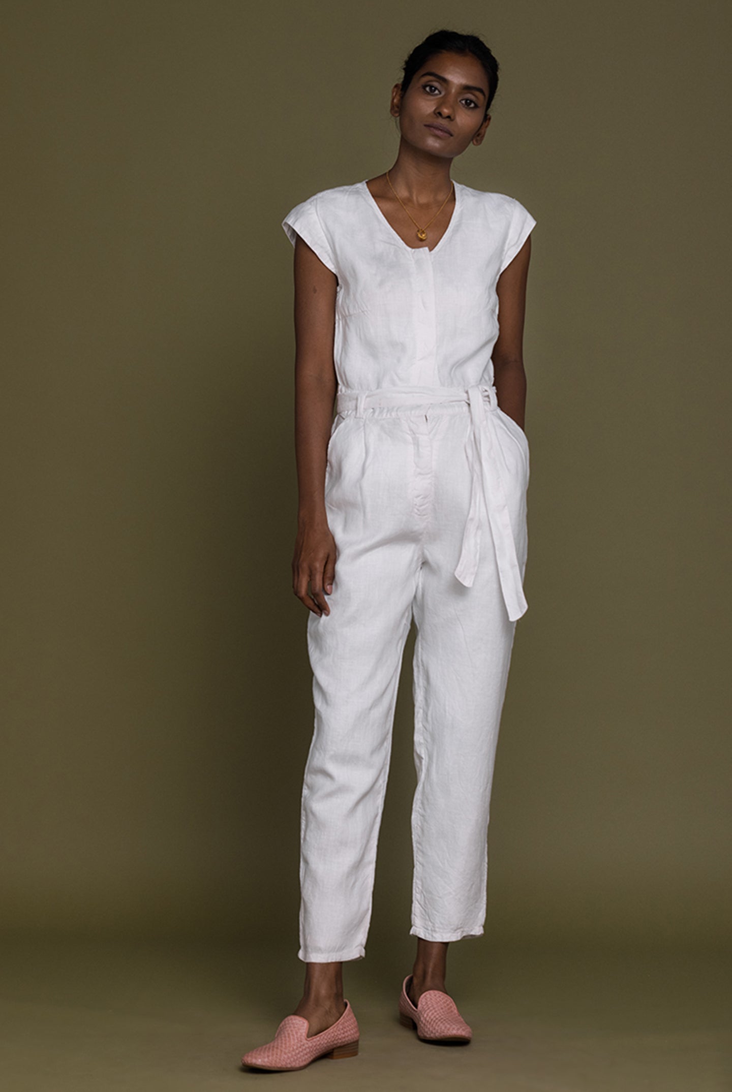 Reistor Evening Chai Jumpsuit in White featuring a relaxed fit, cap sleeves and breathable linen for timeless elegance