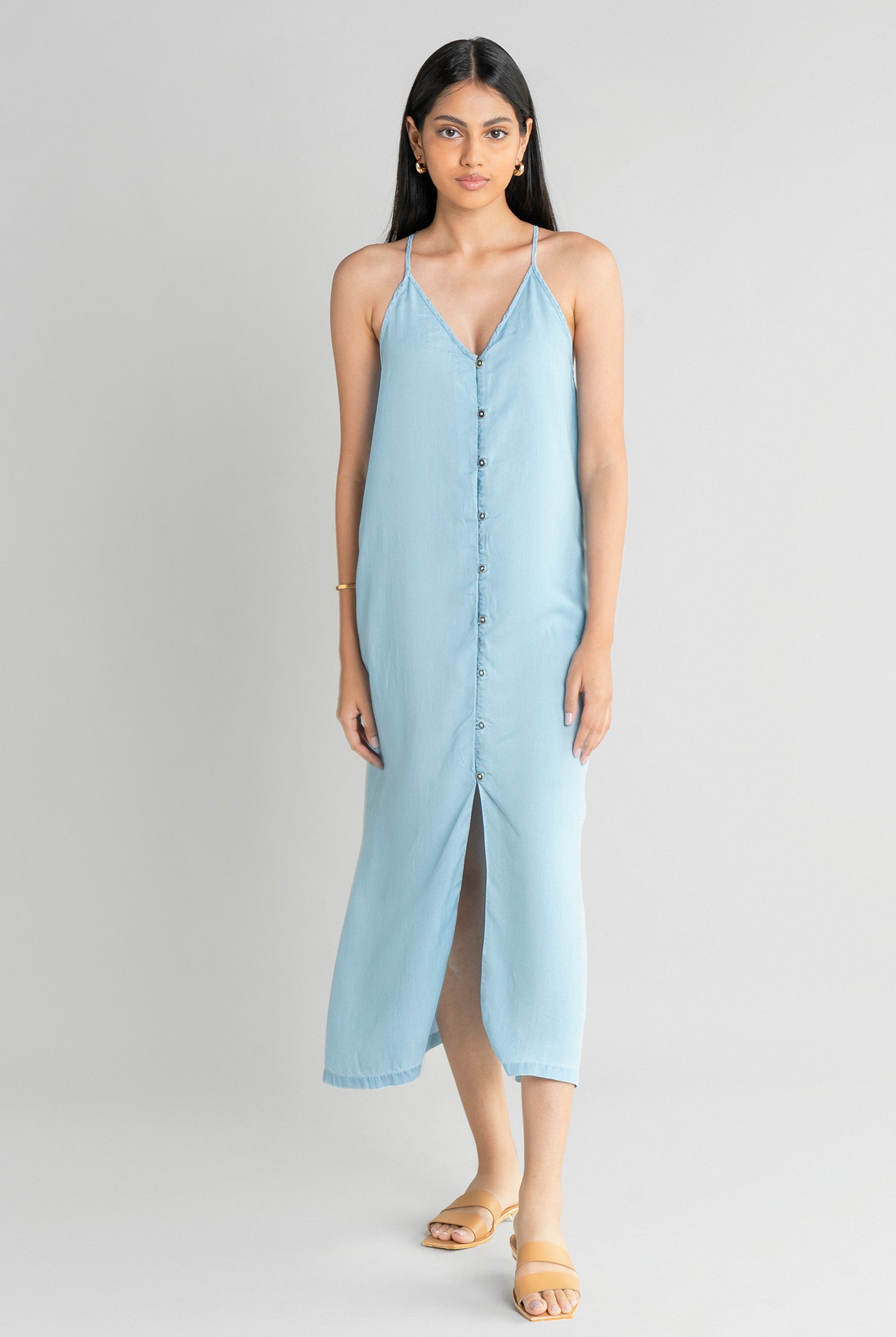 Full-length front profile of the Reistor In the Mood for Love Denim Midi Dress, highlighting breathable denim fabric, a relaxed drape and timeless everyday style.