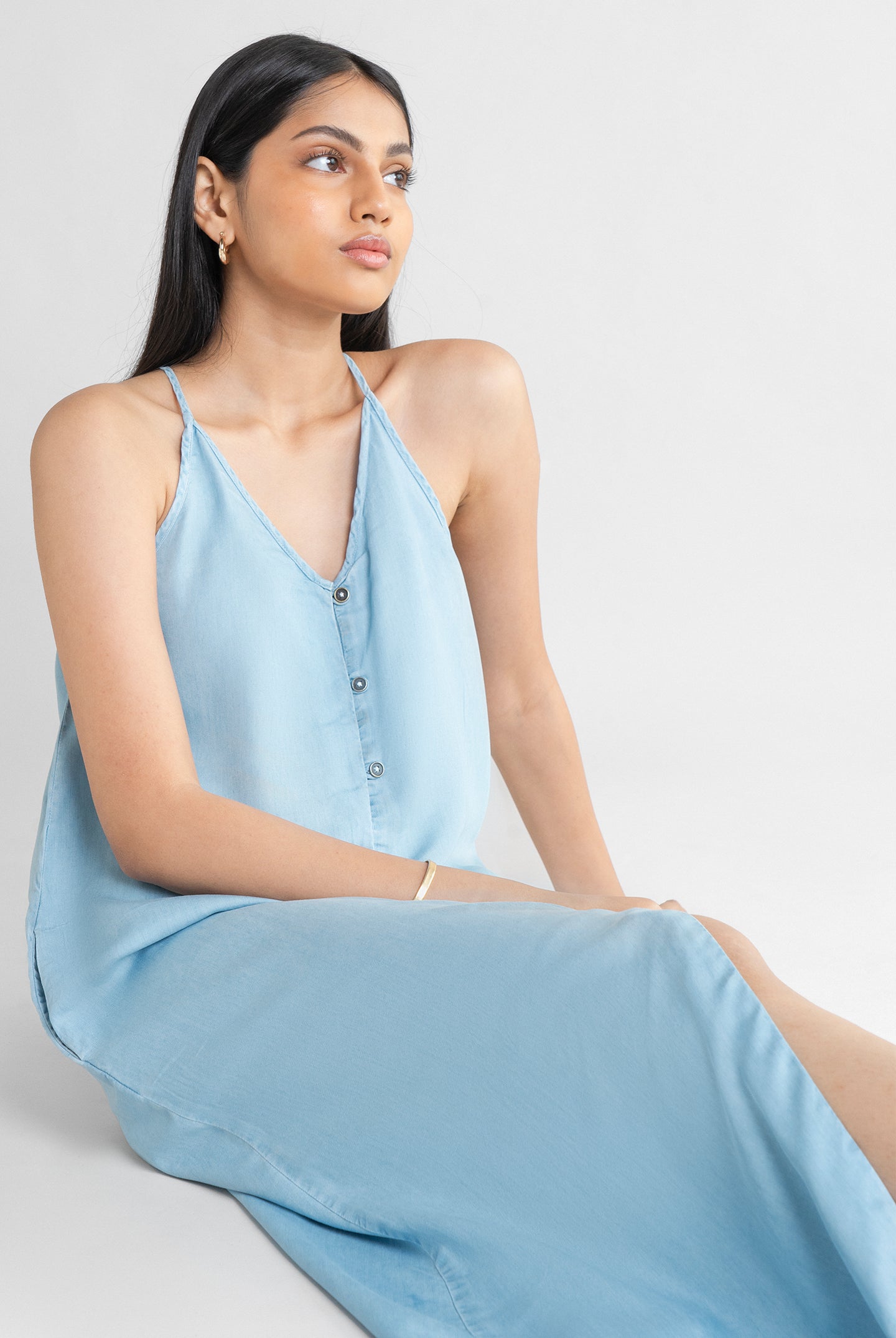 Women's Reistor In the Mood for Love Denim Midi Dress crafted from breathable lightweight denim with a flattering V-neck and timeless minimalist styling.