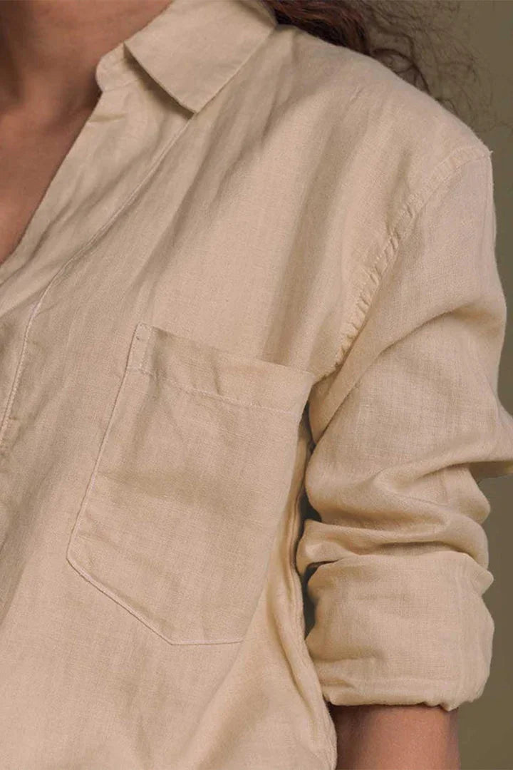 Meet me by the Cliff Dress in Neutral Beige by Reistor, close-up of the collar and pocket on a sustainable dress