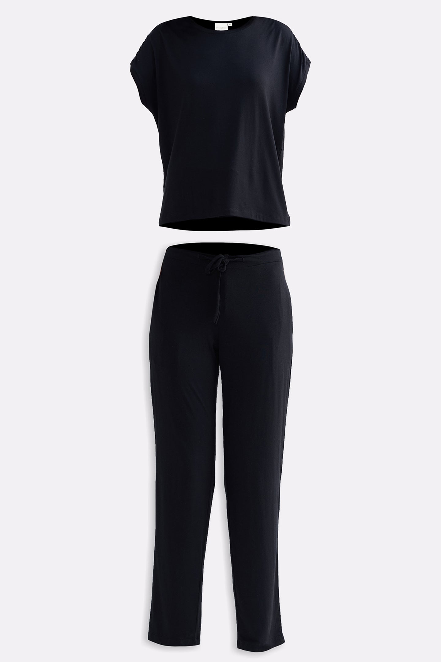 Women’s Black Relaxed tee and pants set on a white background