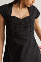 Ruched Dress with Front Slit in Black Medium Shot