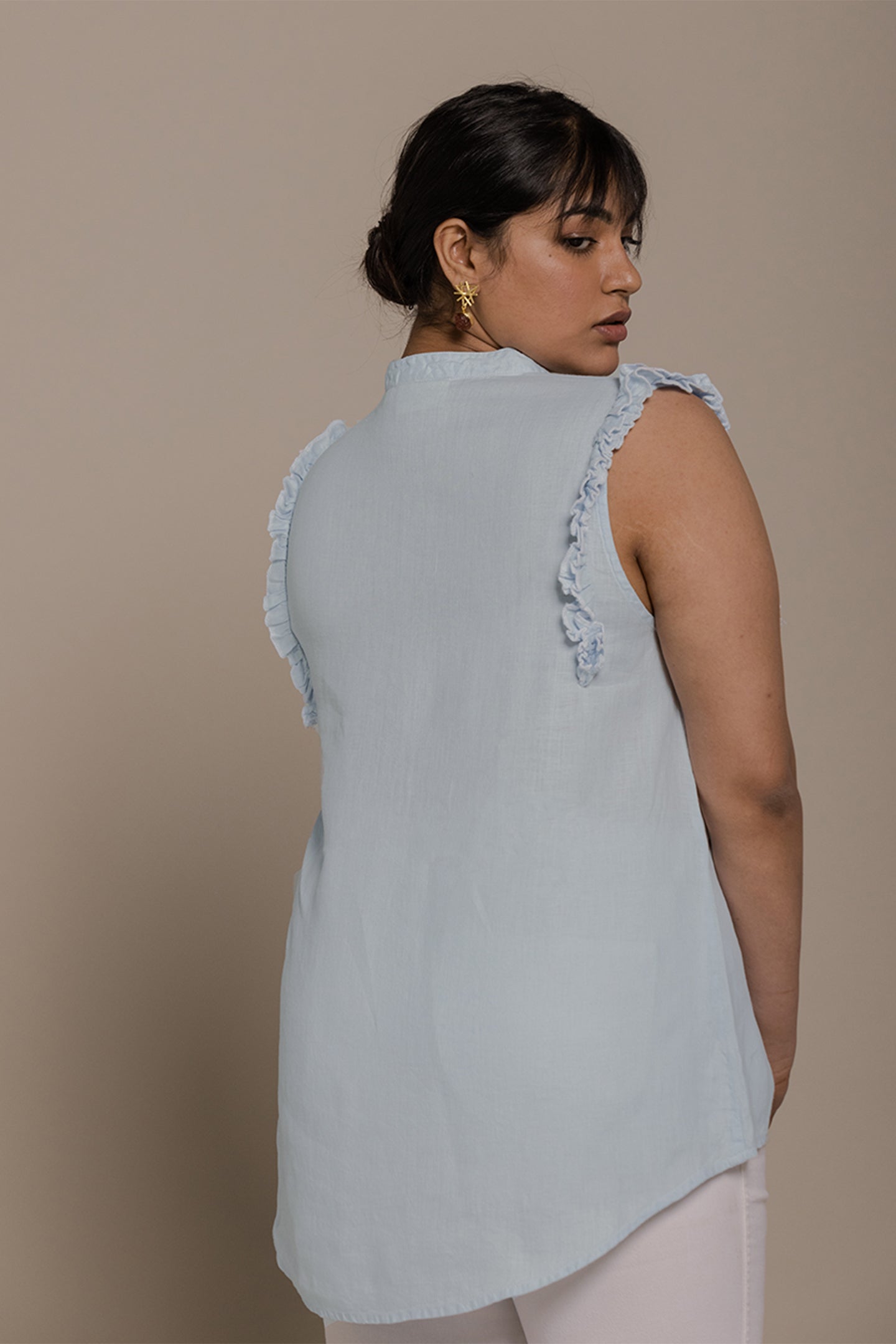 Reistor Wind in my Hair Shirt in Blue with ruffle sleeves, airy sustainable fabric and an elegant relaxed fit for women