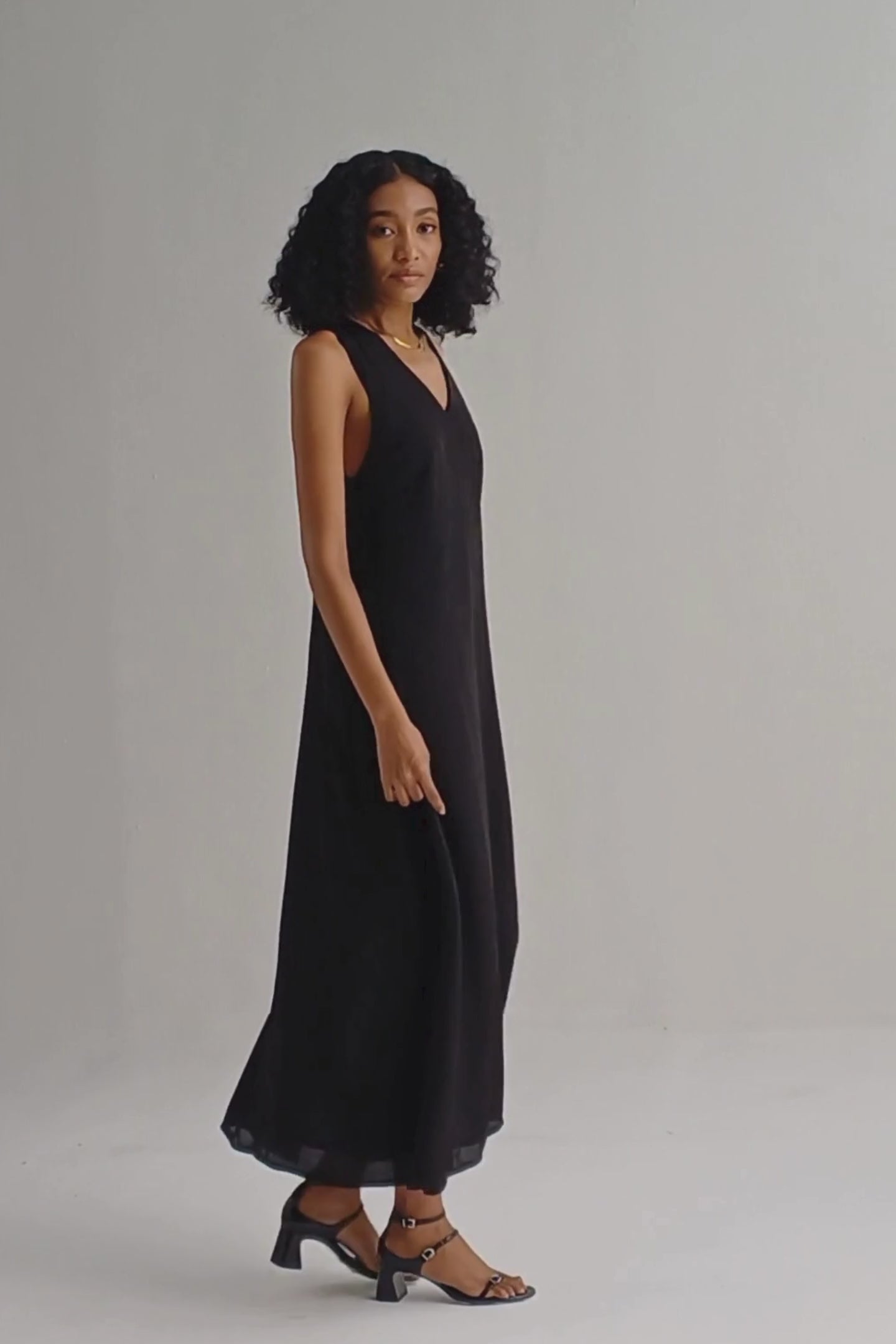 Crossed in Chic Sleeveless Maxi Dress in Black moodshot