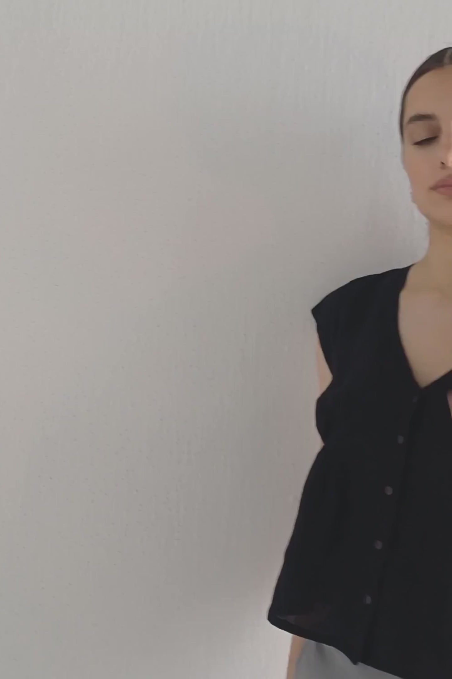 Deep V-neck short top in Black Moodshot Video