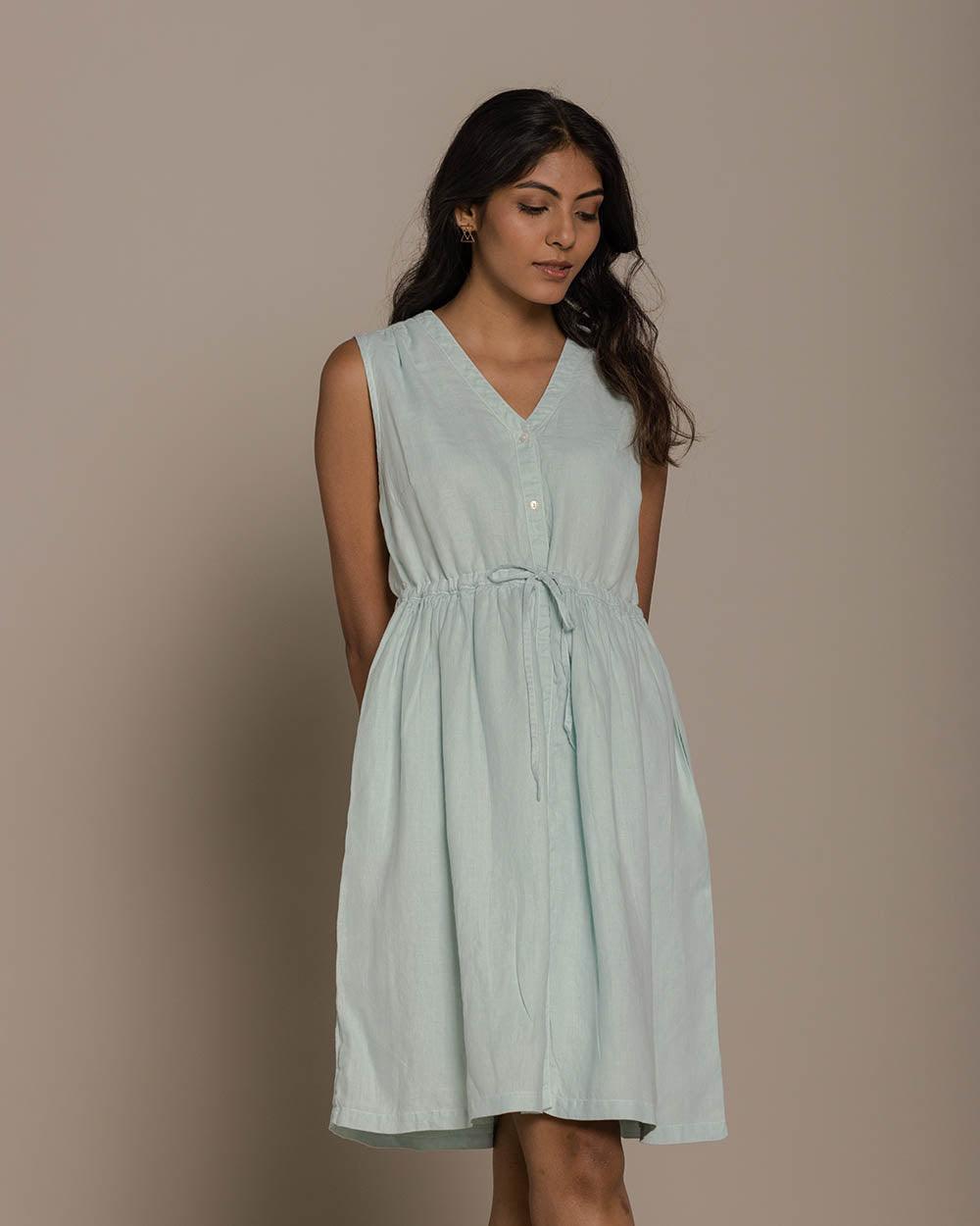functional mint mid length sleeveless dress with a drawstring to define the waistline.
