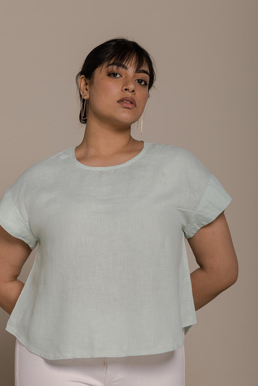 mint mini sleeves top with a peephole back, timeless yet comfortable