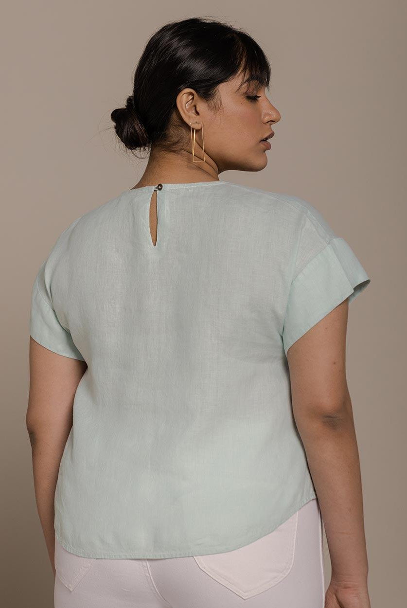 mint mini sleeves top with a peephole back, timeless yet comfortable