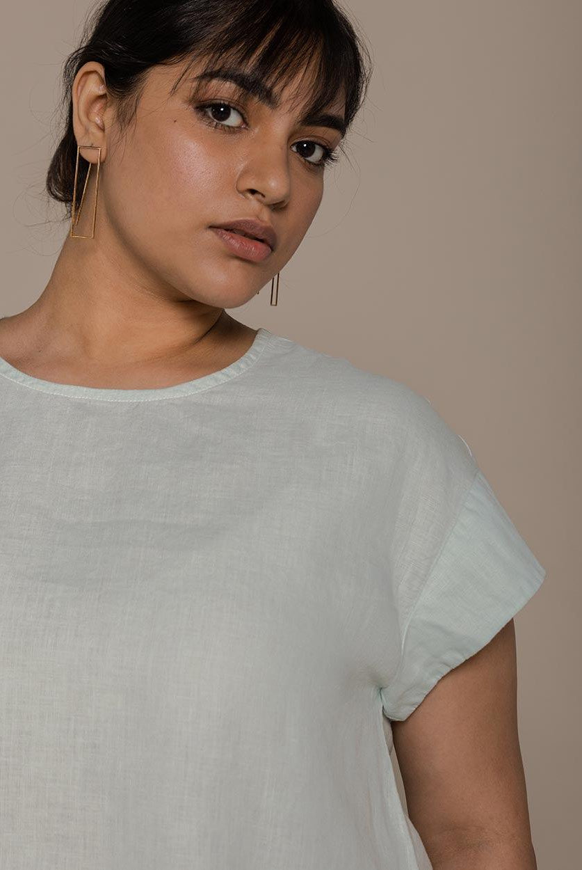 mint mini sleeves top with a peephole back, timeless yet comfortable