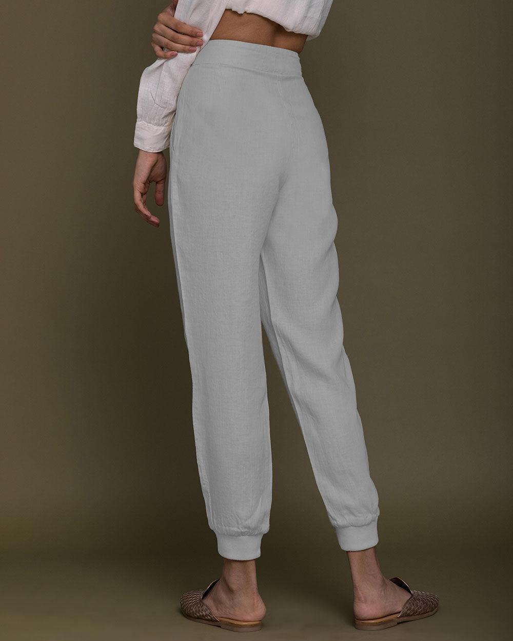 Back view of Reistor The Summer Sweats featuring a relaxed tapered fit, cuffed ankles, breathable sustainable fabric and effortless everyday comfort.