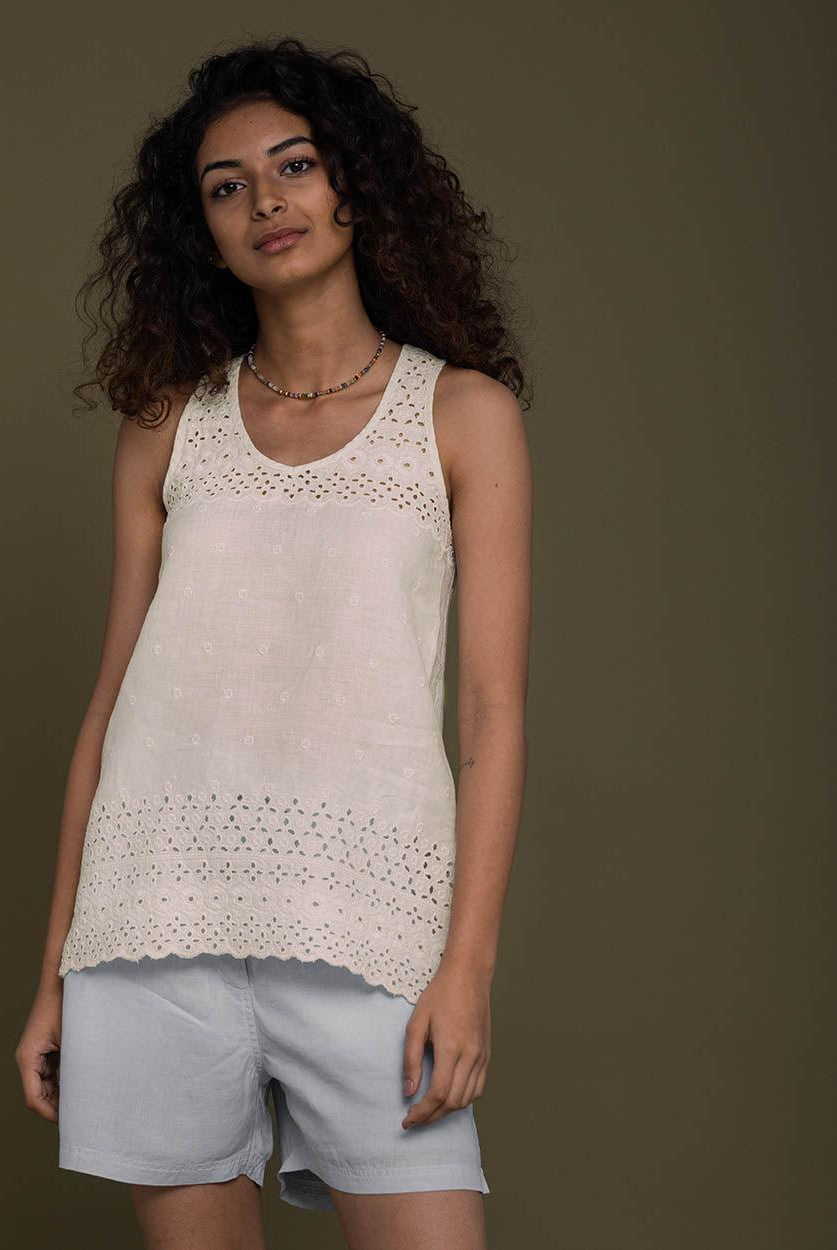 off white T back top with a v neck and embroidered details front and behind
