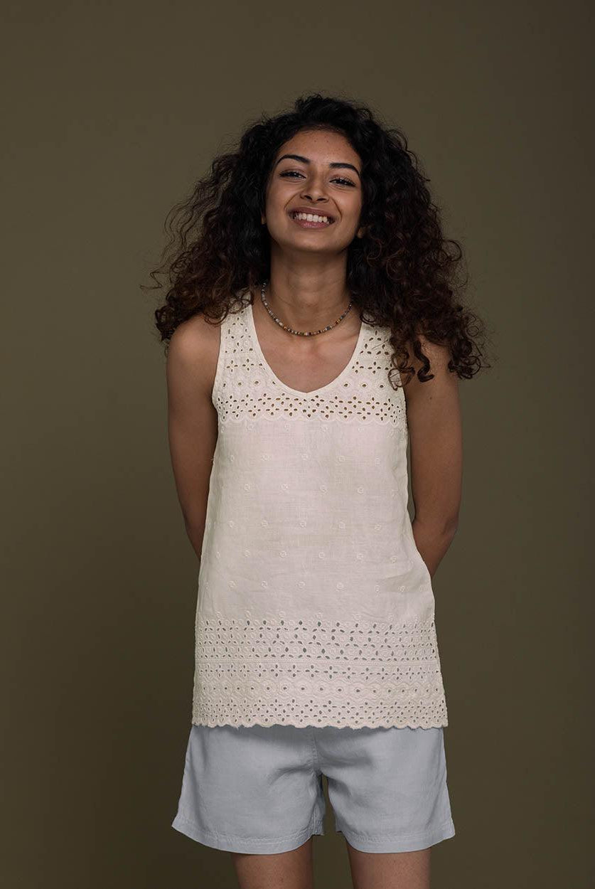 off white T back top with a v neck and embroidered details front and behind
