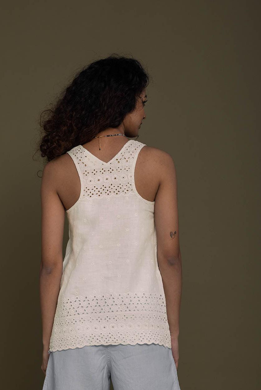 off white T back top with a v neck and embroidered details front and behind