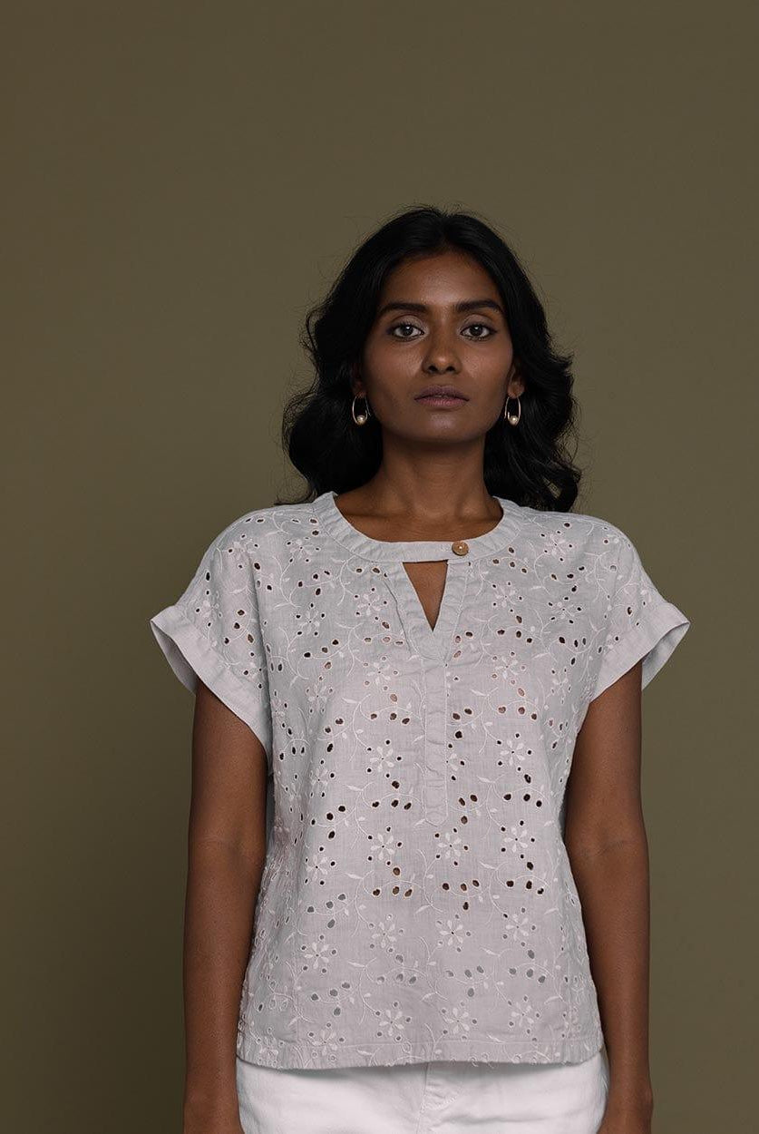 cloud greyembroidered top with side pockets.