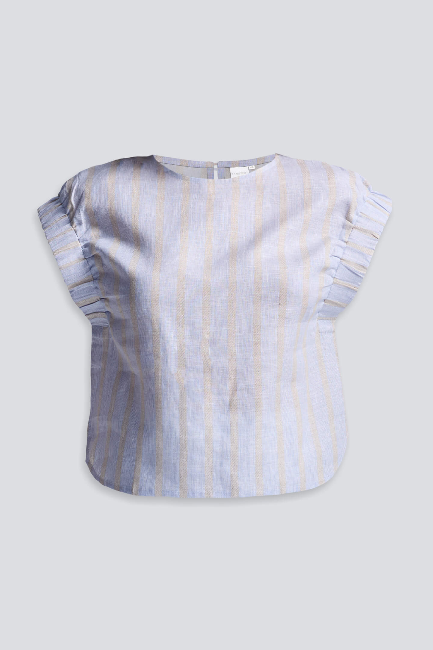 Close-up of a model wearing the reistor Boxy Top with Sleeve Detailing in a blue and tan vertical stripe pattern, paired with white shorts.