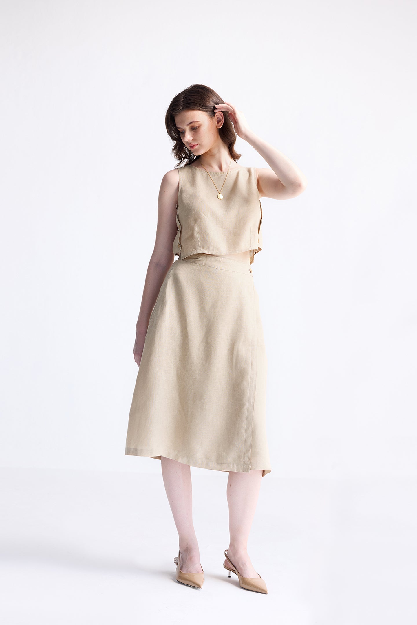 Breezy Summer Set in Neutral Beige by reistor – minimalist women’s co-ord set with sleeveless top and flowy midi skirt.