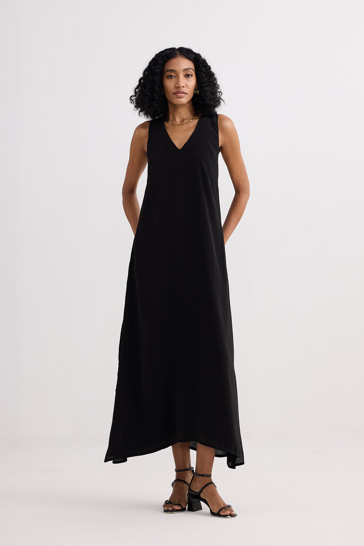Crossed in Chic Sleeveless Maxi Dress in Black Longshot