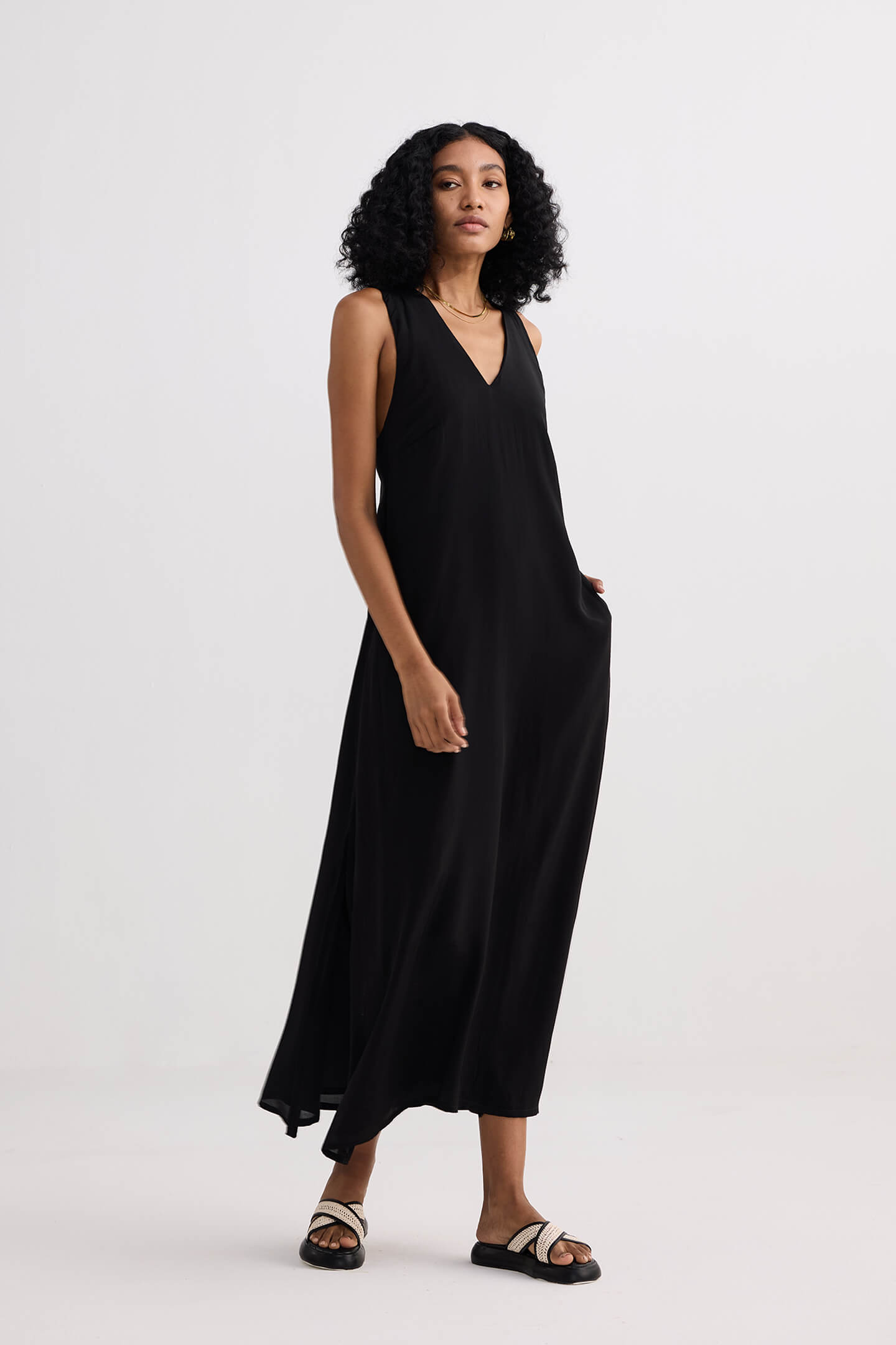 Crossed in Chic Sleeveless Maxi Dress in Black Longshot
