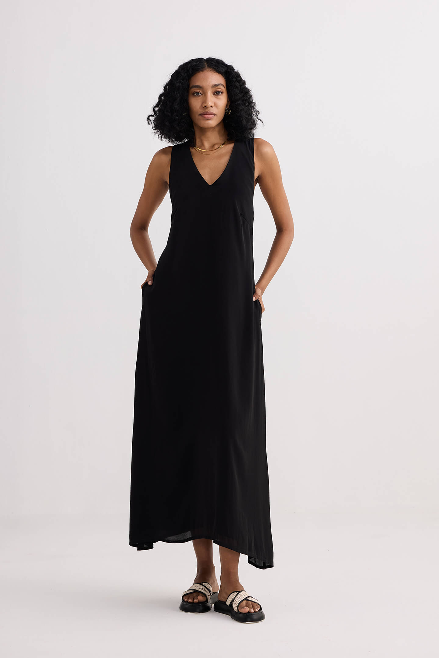 Crossed in Chic Sleeveless Maxi Dress in Black Longshot
