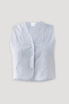 Striped sleeveless top on a light gray background