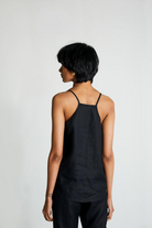 Reistor Sandcastle Saturdays Top in Black, sustainable women's camisole top with a racerback design, breathable fabric, and relaxed everyday fit. 