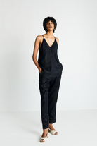 Reistor Endless Sunday Top in Black, stylish sleeveless women's top with a relaxed fit and soft sustainable fabric, perfect for everyday wear and versatile styling.