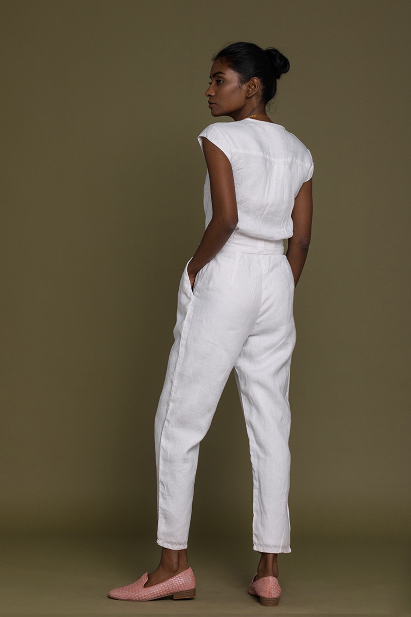 Reistor Evening Chai Jumpsuit in White, sustainable women's one-piece with a minimalist look and modern comfort.