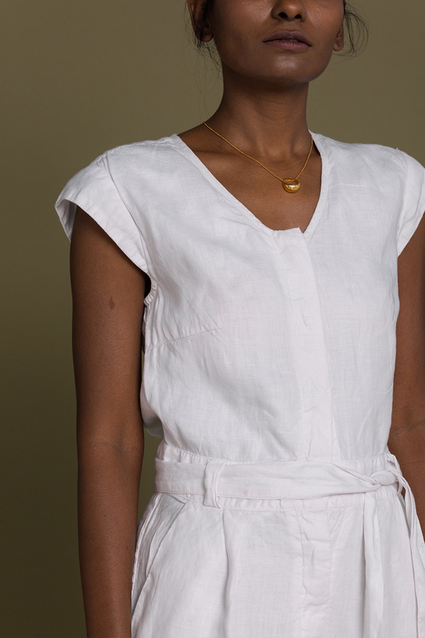 Reistor Evening Chai Jumpsuit in White, minimalist women's sustainable jumpsuit with a soft, versatile and refined look.