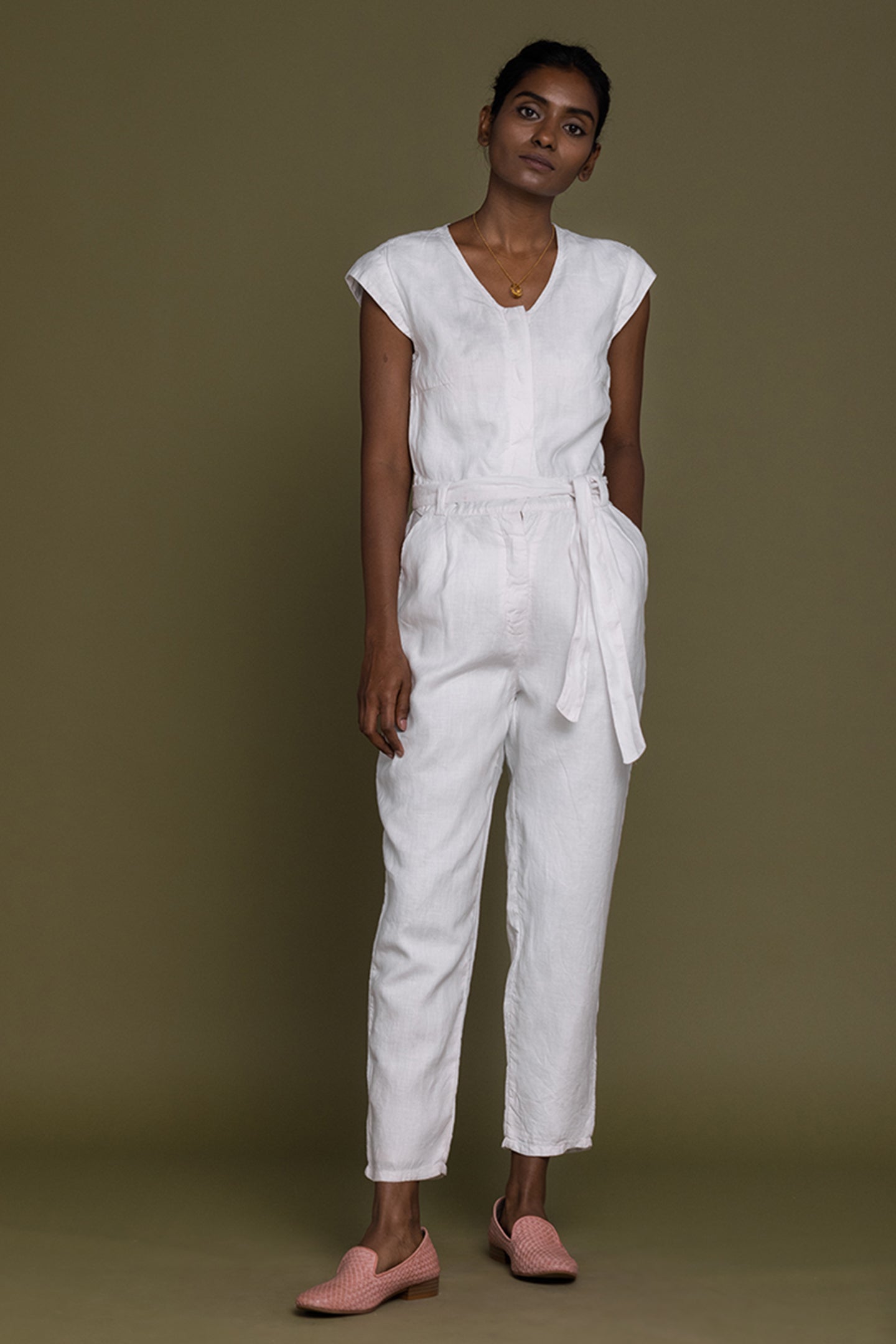 Reistor Evening Chai Jumpsuit in White featuring a relaxed fit, cap sleeves and breathable linen for timeless elegance