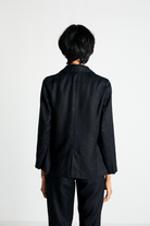 Reistor Hemp Three Piece Set in Black displayed from the rear, highlighting the structured blazer, clean tailoring and eco-friendly hemp craftsmanship.