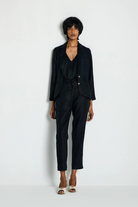Front view of the Reistor Hemp Three Piece Set in Black, featuring a tailored blazer, V-neck camisole and tapered trousers in breathable hemp fabric.