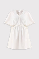 White dress on a light gray background