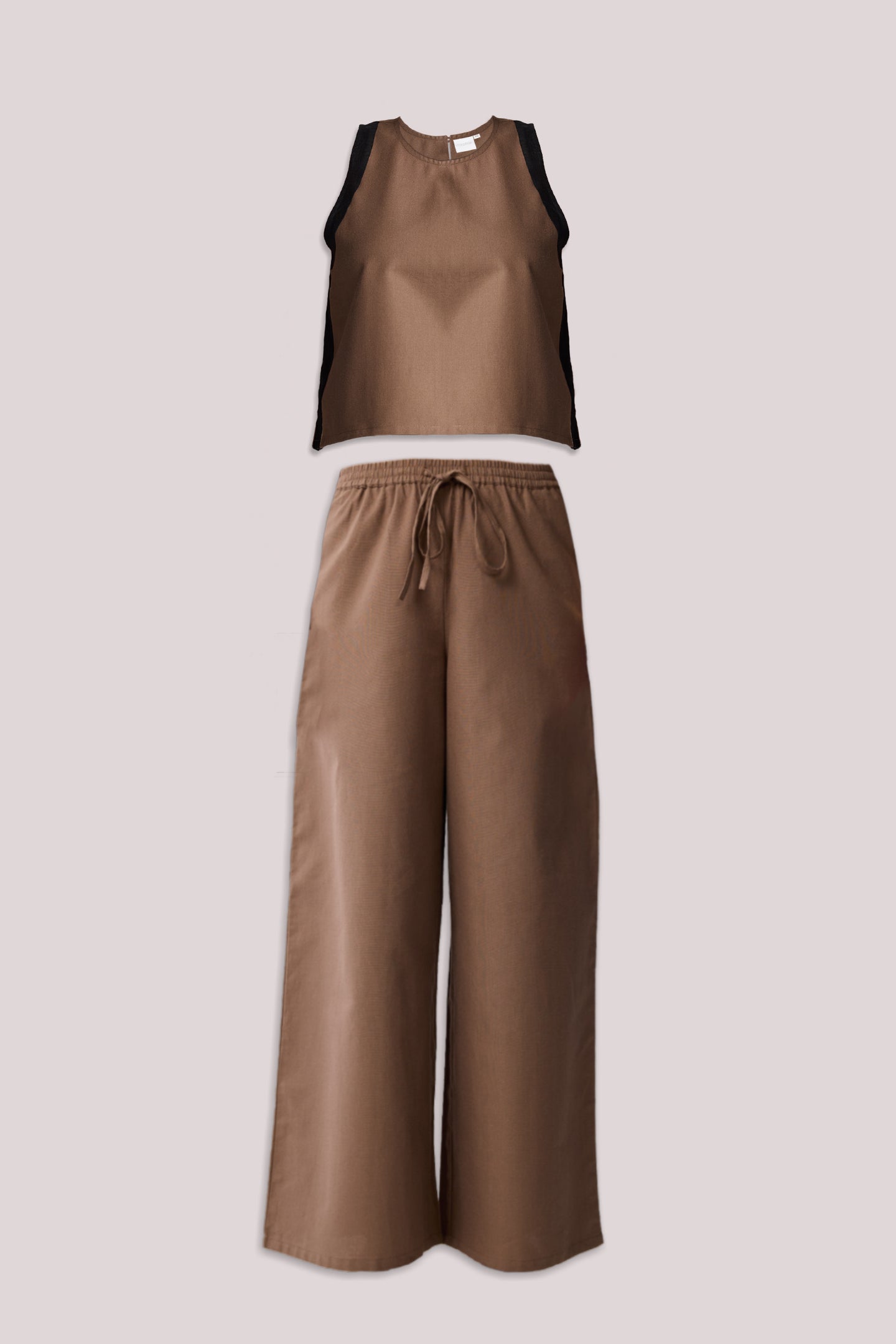 Brown sleeveless top and wide-leg pants on a light gray background — Reistor.
