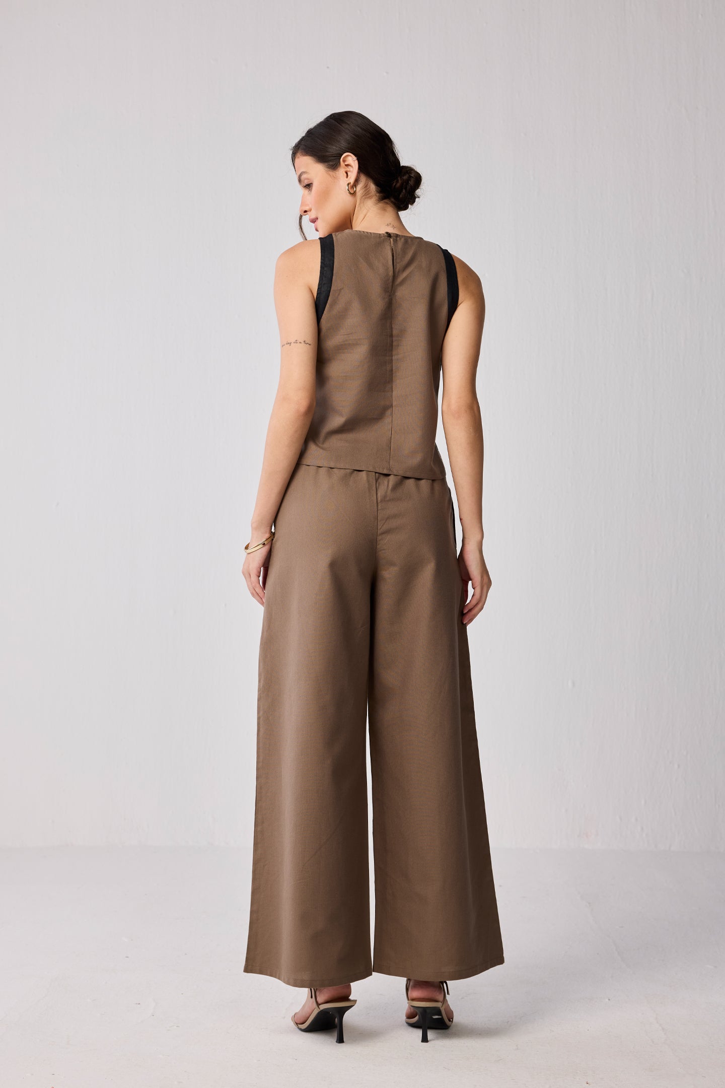 Rear view of the brown Matching Set with Wide-leg Pants and Colorblock Top showing the back seam detail and relaxed fit.