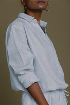 Reistor Meet Me by the Cliff Dress in Blue featuring a relaxed fit, breathable fabric, classic collar, and timeless style