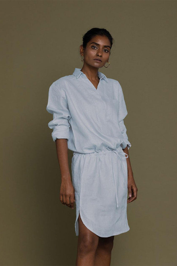 Reistor Meet Me by the Cliff Dress in Blue featuring a relaxed shirt dress silhouette, side slit, breathable fabric, and modern style