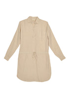 Meet me by the Cliff Dress in Neutral Beige by Reistor is a sustainable shirt dress with a relaxed fit, adjustable waist, and breathable comfort for every day.