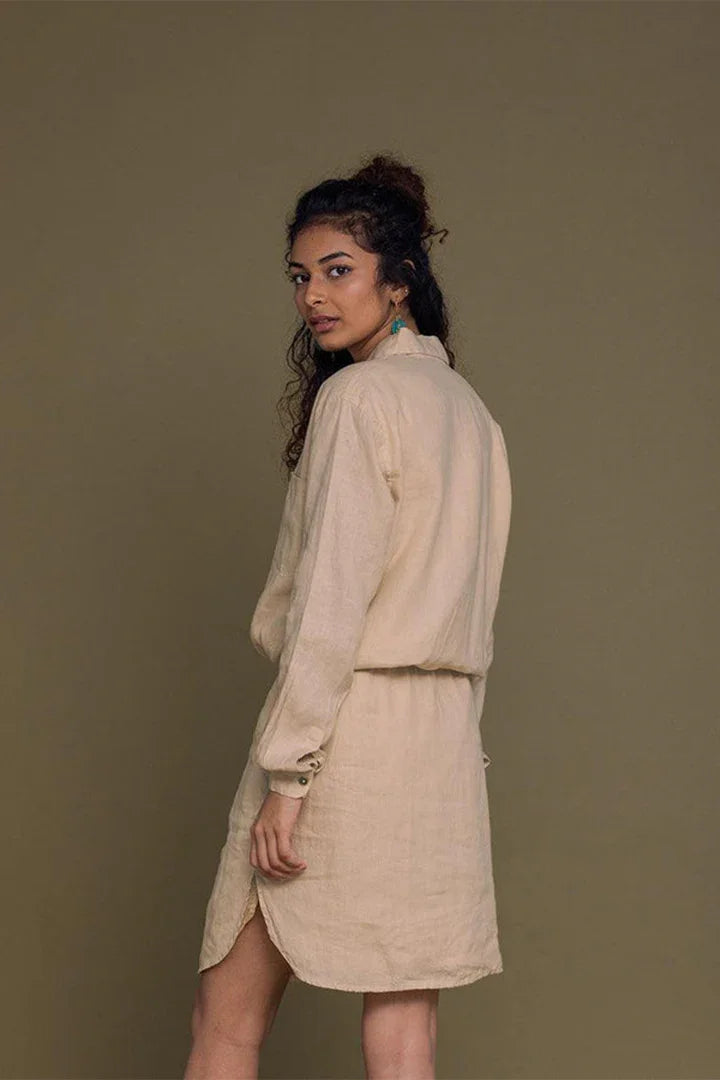 Meet me by the Cliff Dress in Neutral Beige by Reistor, back view of a sustainable women's beige shirt dress