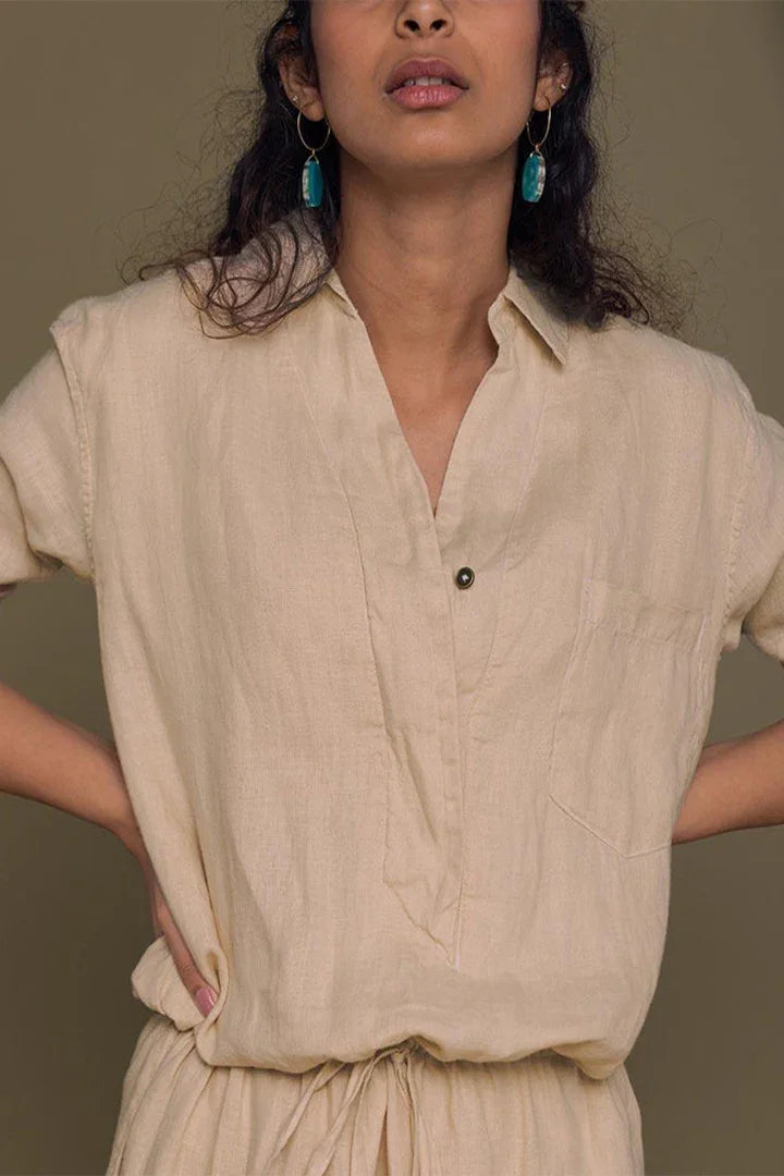 Meet me by the Cliff Dress in Neutral Beige by Reistor, front detail of a sustainable beige shirt dress for women
