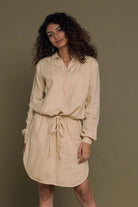 Discover the Meet me by the Cliff Dress in Neutral Beige by Reistor, a sustainable women's dress with a relaxed silhouette, breathable comfort, and timeless style.