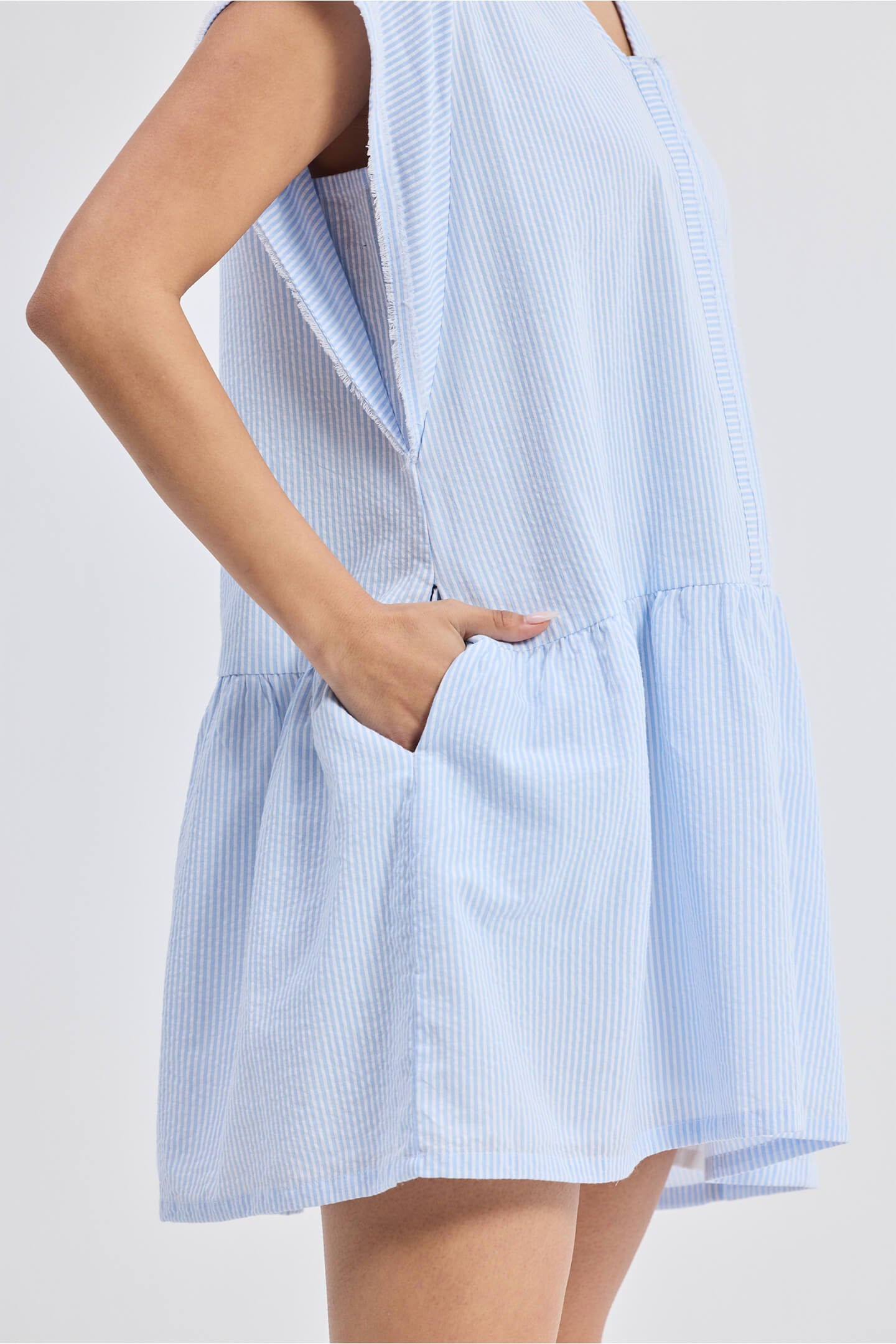 Oversized V neck Short Dress with Frayed Sleeves Closeup Shot