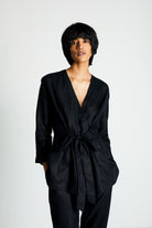 Reistor Power Moves Shirt in Black, black hemp shirt with a tie-up waist, relaxed fit, breathable sustainable women's top for effortless everyday style.