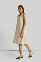 Reistor Reading Tea Leaves Dress in Ecru, sustainable sleeveless A-line midi dress with breathable linen fabric, relaxed fit, and effortless everyday style.
