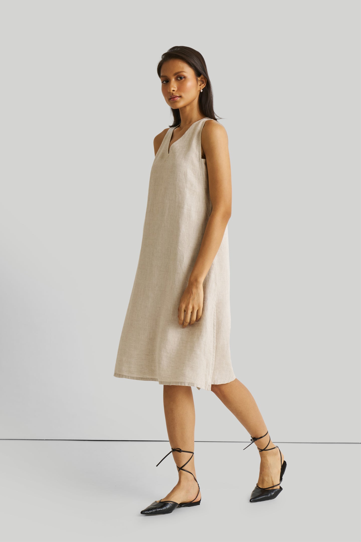 Reistor Reading Tea Leaves Dress in Ecru, sustainable sleeveless A-line midi dress with breathable linen fabric, relaxed fit, and effortless everyday style.