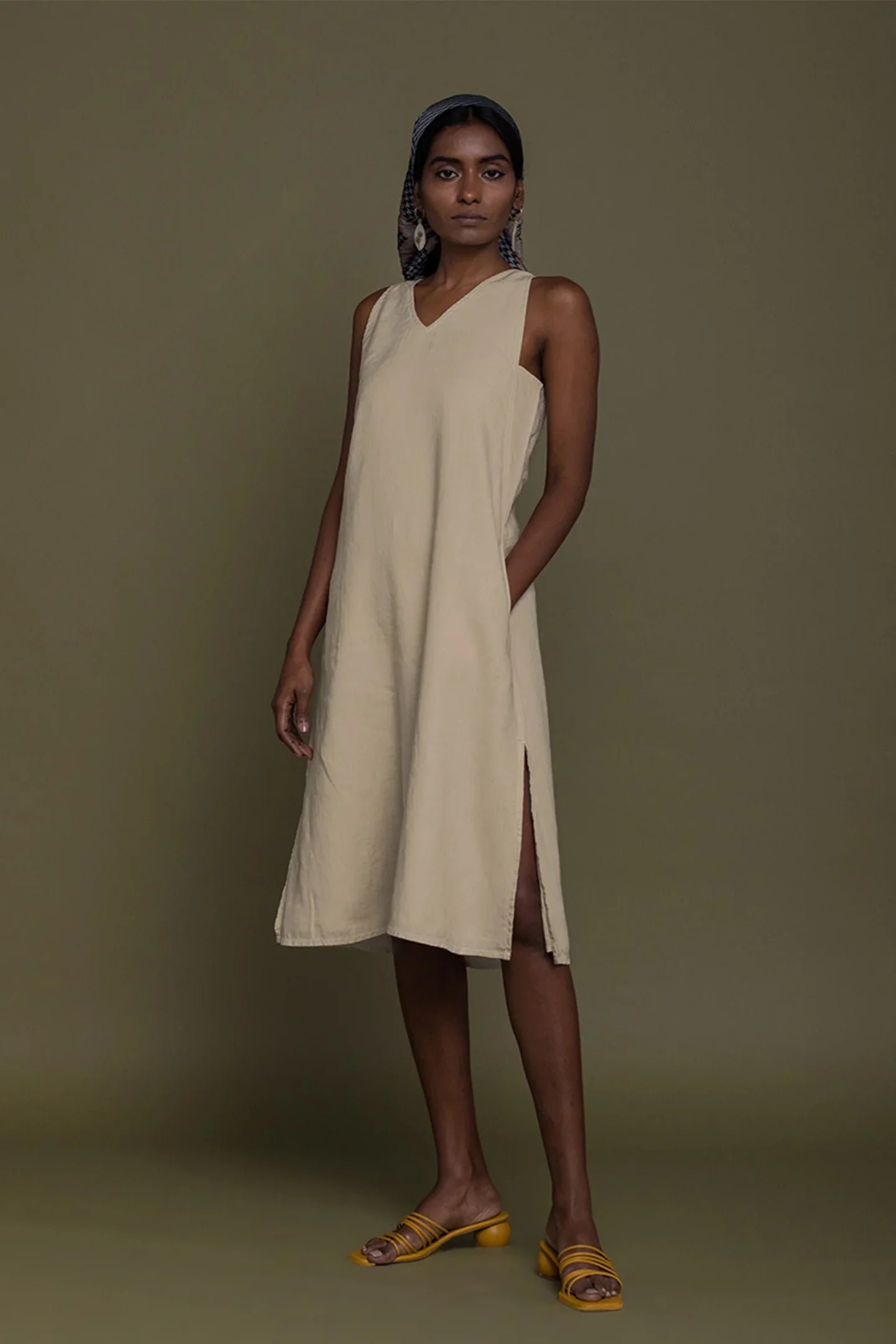 Reistor Reading Tea Leaves Dress in Neutral Beige, sleeveless relaxed midi dress with side slit for women